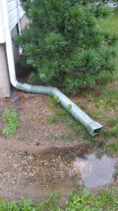 gutter extensions prevent storm water from filling basements