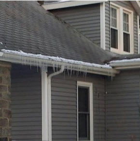 icicles on a roof - first sign of an ice dam