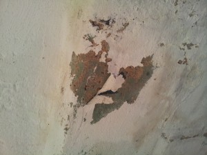 Peeling paint caused by efflouressence