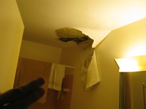 Ceiling water damage from roof drain failure